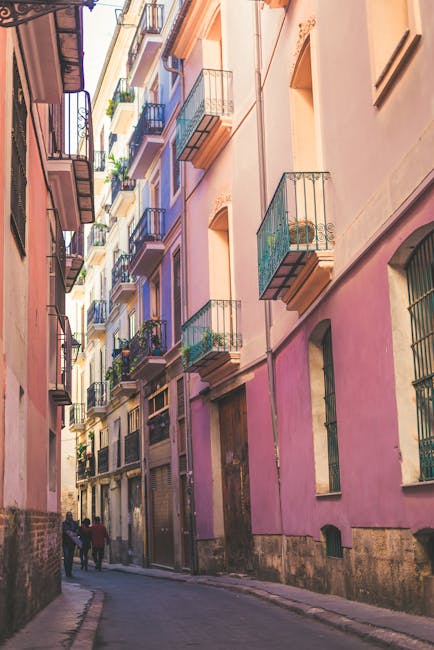 Picturesque street view in Valencia's historic district, showcasing vibrant architecture and urban charm.